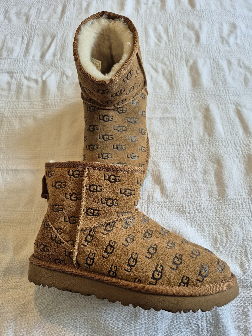 UGG size 6 Classic Mini Embossed boots in Chestnut all-over logo VGUC